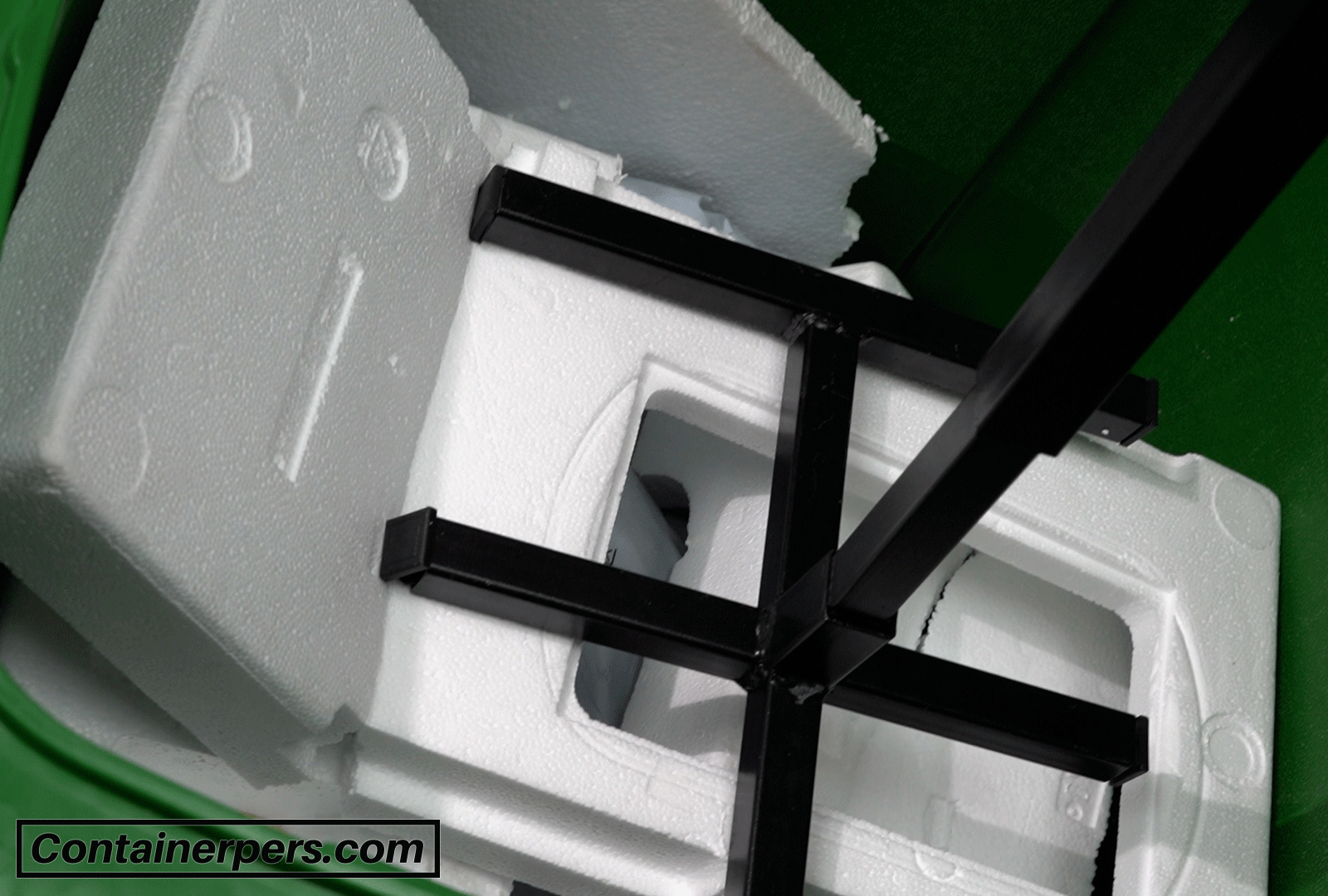 Detailfoto persvlak Containerpers in actie